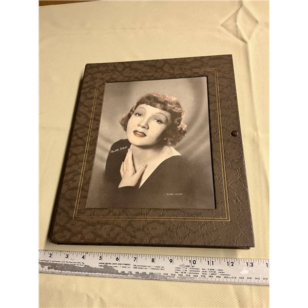 Photo album with lady on cover