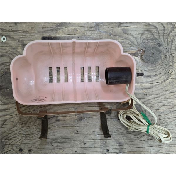 Pink plastic bed lamp