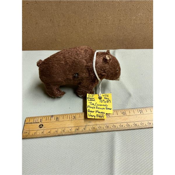 Plush brown bear toy