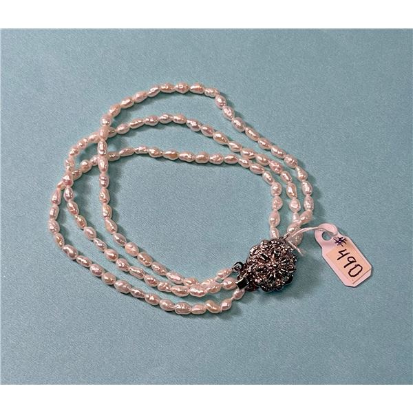 Fresh water Pearl Bracelet, box clasp marked “silver”. Like new.