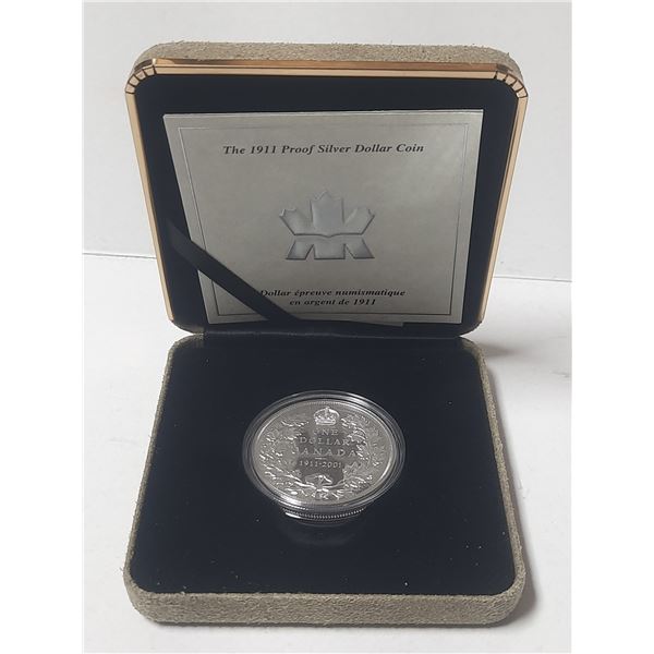 1911 – 2001 Canadian Silver Dollar. Commemorates the 90th Anniversary of the first Pattern 