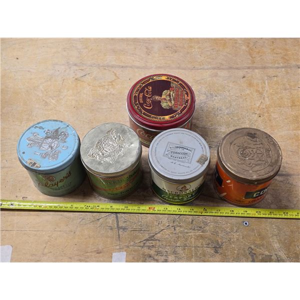 Cigarette, tobacco and coca cola tins