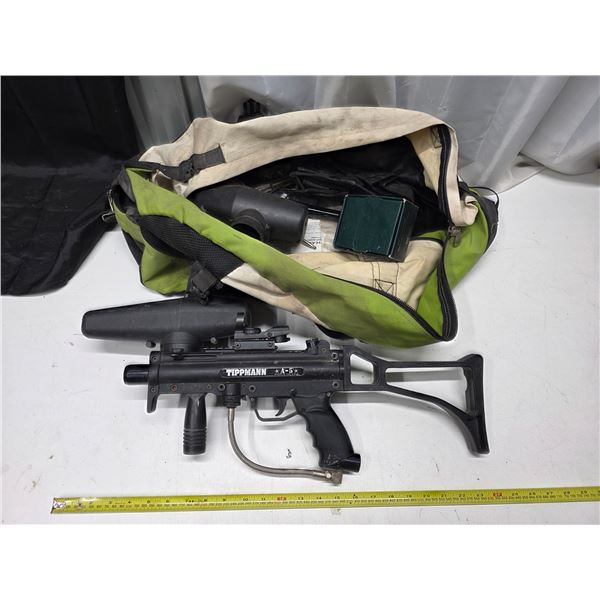 Paint ball gun with accessories and bag