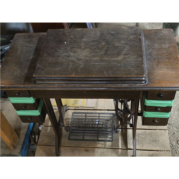 Singer sewing machine and treadle