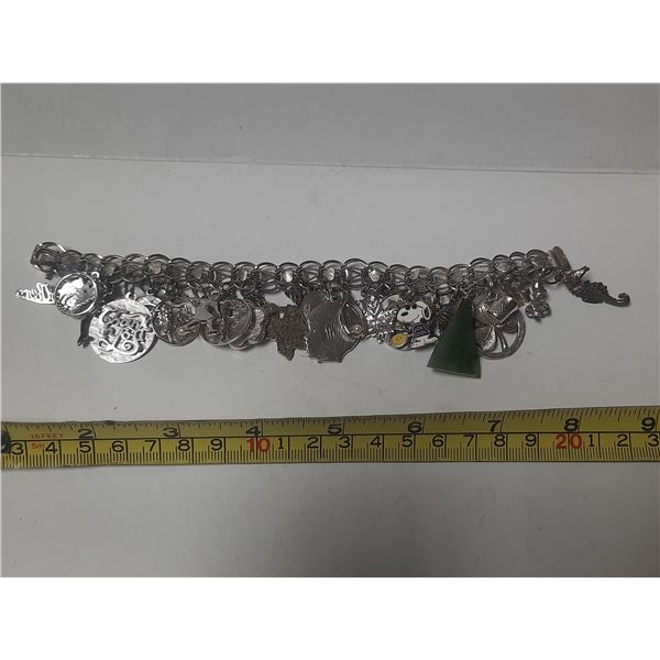 Bracelet & Charms (Bracelet & Most of the charms marked 925. Weight 76.8g.