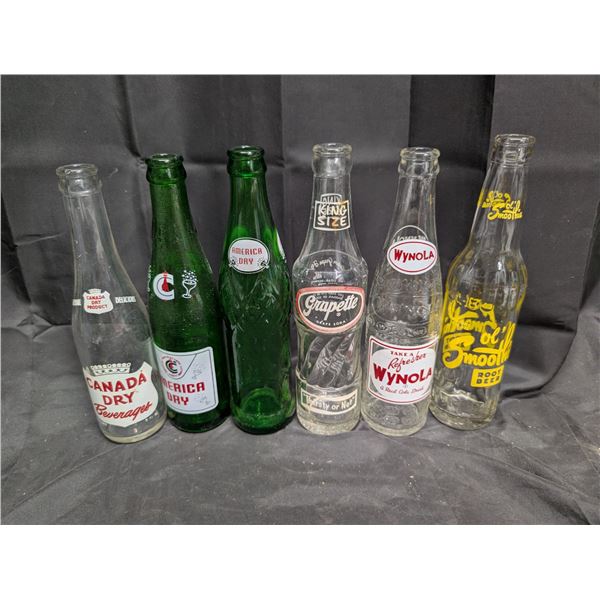 (6) Vintage Pop Bottles (Canada Dry, America Day, Wynola, and etc.)