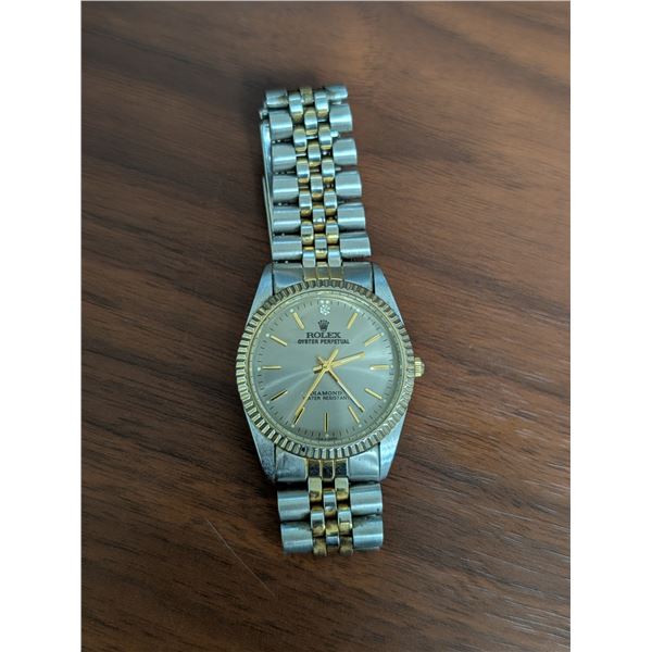 (NOT CONFIRMED) Rolex Oyster Perpetual Diamond Water Resistant St.Steel Back Watch w/ case