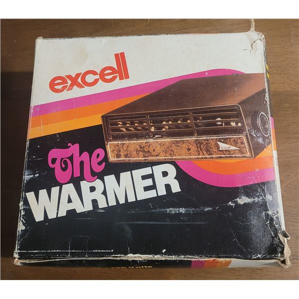 Car warmer original in box, never taken out of box