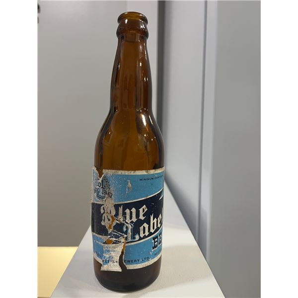 Blue Label Beer bottle Brewed in Regina, SK between approx. 1952-1954 the brewer was sold to Carling