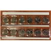 Image 2 : Canada 2000 Millennial set of 12 quarters in commemorative pouch sleeve.
