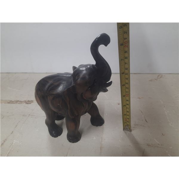 Hand Carved Wooden Elephant Statue with its Trunk Raised from Bali.