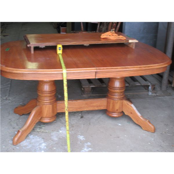 Oak table with leaf - 42"x63"x31"H, 77" with leaf