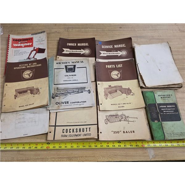 Lot of various farm equipment manuals- some have mold on them