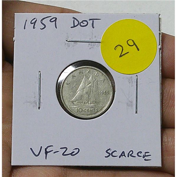 1959 Dot Canadian Silver 10 Cents. There is a Die Chip (called a Dot) below the 5 in the date. VF-20