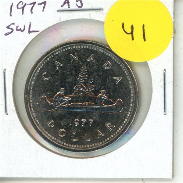 1977 Attached Jewels Short Water Lines Canadian Nickel Dollar. Short WL in front of the canoe. MS-60