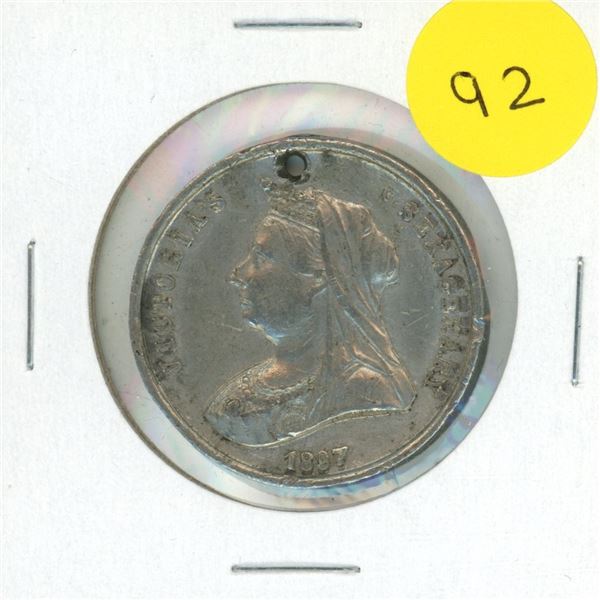 1837 - 1897 Queen Victoria medal. In Commemoration of the Longest British Reign. VF+. Holed for susp