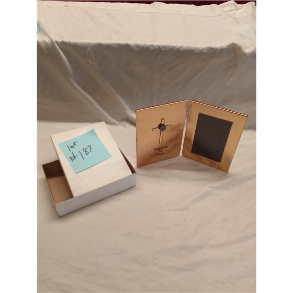Elegant gold-tone double photo frame commemorating "Baptism in Christ". Features a raised silver cro