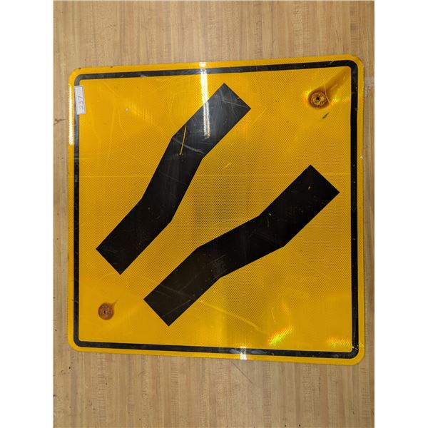 Pavement Narrows Highway Sign
