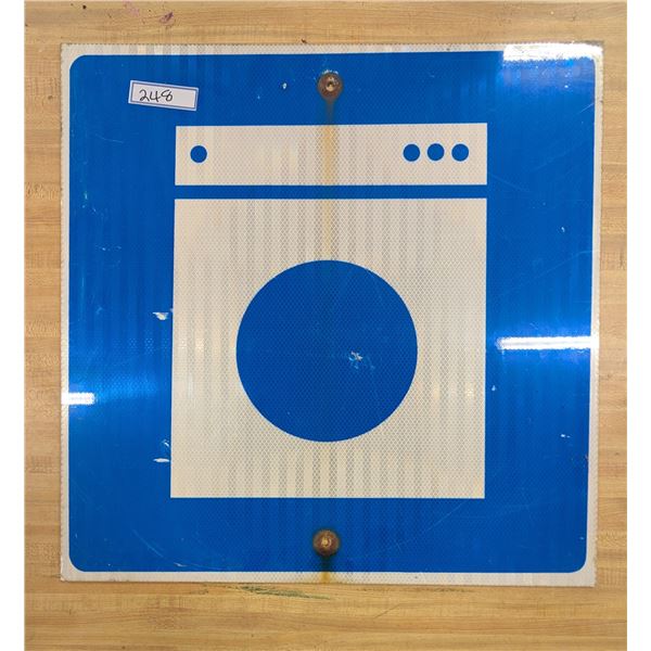 Laundry Services Ahead Highway Sign