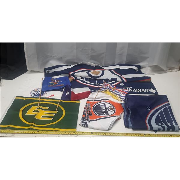Lot of Hockey Team Flags and Other Flags.