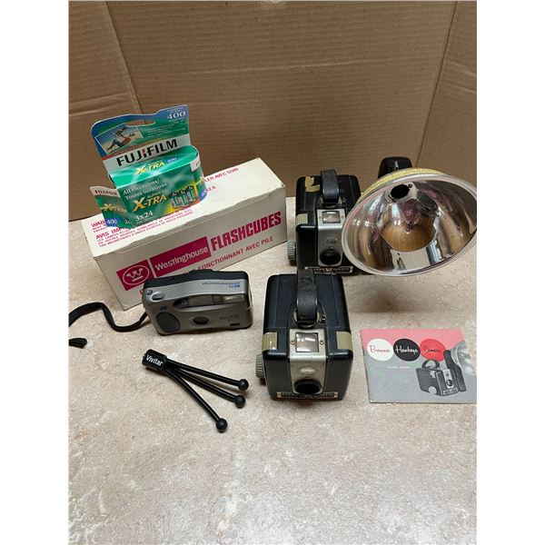 2 Brownie Hawkeye Cameras, Vivitar BV 75camera and stand, Box of Flashcubes, Flasholder, 2 Fujifilms
