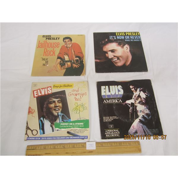 751. Lot of 4 Elvis 45 RPM Records with Picture Sleeve Good Condition