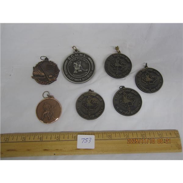 753. Lot of 7 Vintage Hockey Medals