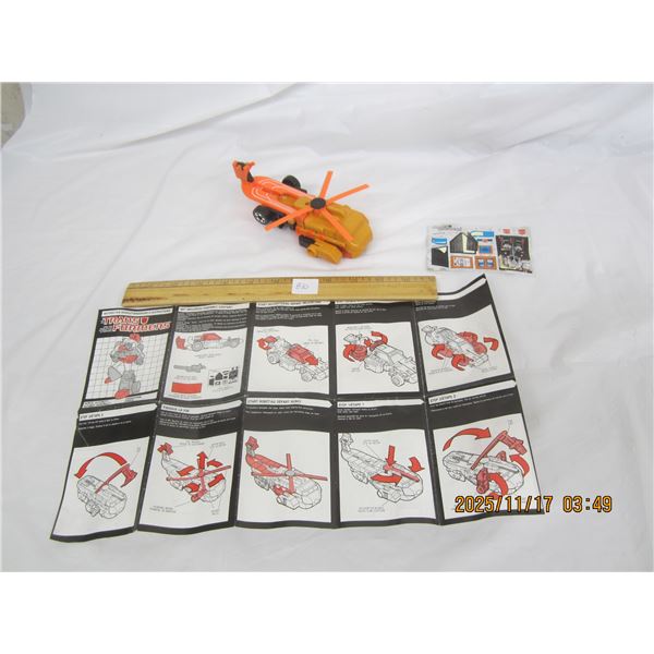 810. 1986 Auto Bot Transformer Sandstorm Robot Helicopter Car in Good Condition with Decals and Inst