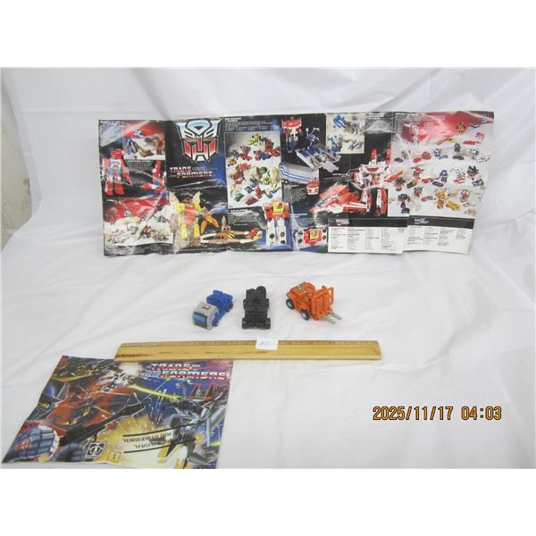 812. Lot of 3 1980's Transformers Auto Bots Forklift, Jeep, Truck with 2 Brochures Good Condition