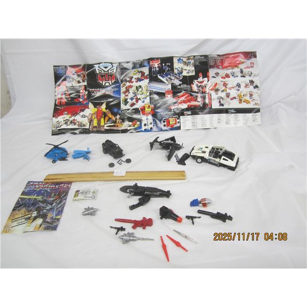 813. Lot of 1980's Transformers in Need of Repair or Parts Extra Guns and 2 Brochures