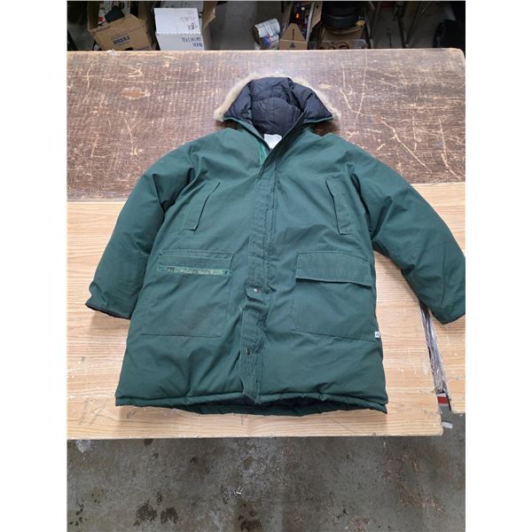 Green warm Parka with attached hood. Good condition. Size XXL.