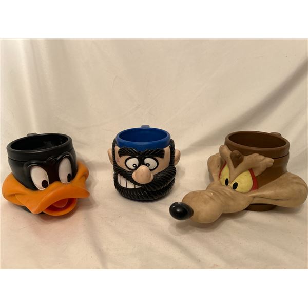 Loonie Tunes character Mugs-Daffy, Wyley and unknown character with a black beard