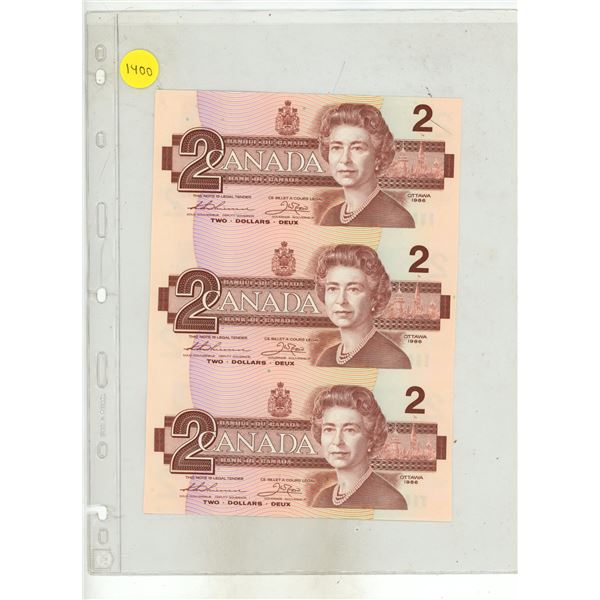 Partial Uncut Sheet of 3 1986 Canadian $2 notes. Thiessen-Crow signatures. EBA Prefixes. Uncirculate