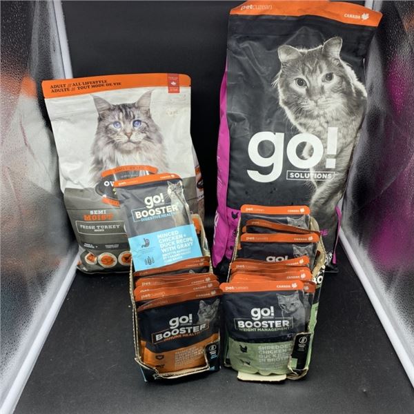 TWO BAGS OF CAT FOOD AND 25 POUCHES OF CAT BOOSTER