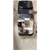 Image 2 : TWO DELONGHI MAGNIFICA ESPRESSO MACHINES BOTH POWER ON AND DISPENSE HOT WATER STORE RETURNS FOR PART