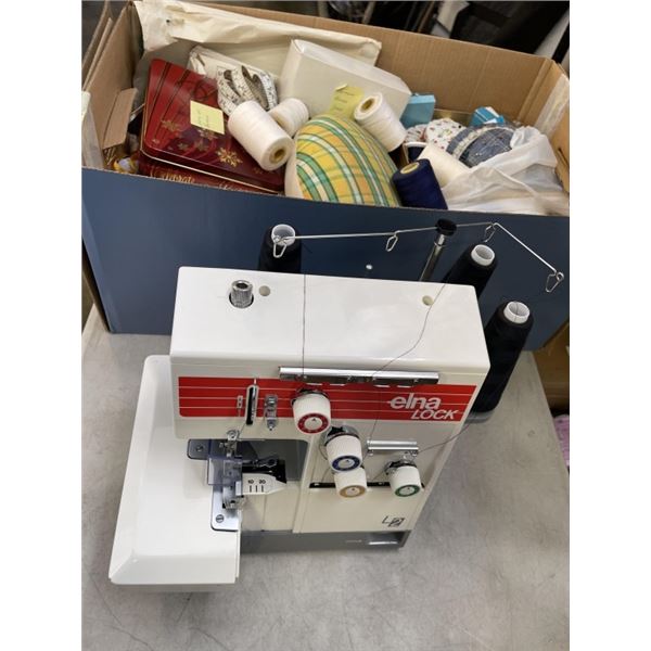 LARGE BOX OF SEWING SUPPLIES AND ELNA SEWING MACHINE