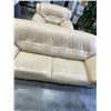 Image 1 : BEIGE LEATHER SOFA AND OVERSIZED CHAIR