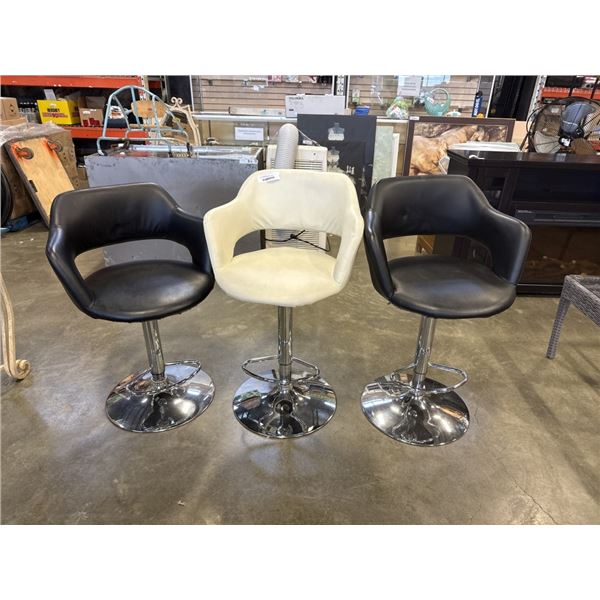 2 BLACK LEATHER BAR STOOLS AND 1 WHITE