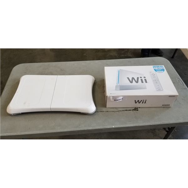 WII CONSOLE AND AND GAME BOARD