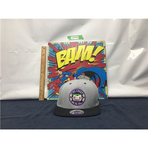 Metal Batman sign and a Funko Pops Joker Hat