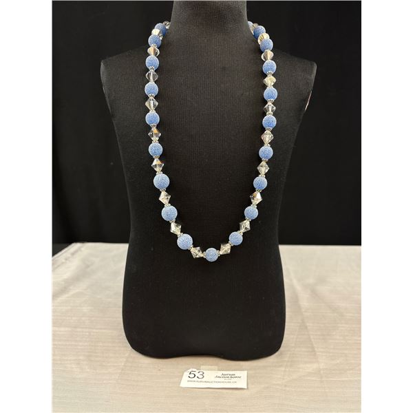 Blue and Clear Beaded Necklace featuring Textured Blue Beads 26"