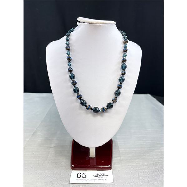 A Vintage Necklace Featuring Faceted Blue Glass Crystal Beads 20" Long
