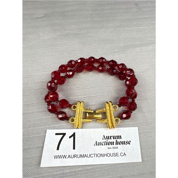 A Double Strand Vintage Red Faceted Glass Beaded Bracelet with Gold Tone Clasp