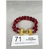 Image 1 : A Double Strand Vintage Red Faceted Glass Beaded Bracelet with Gold Tone Clasp