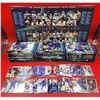 Image 1 : Canucks Collectible Lot w/ Assorted Cards, Magazines, & Wall Hanging