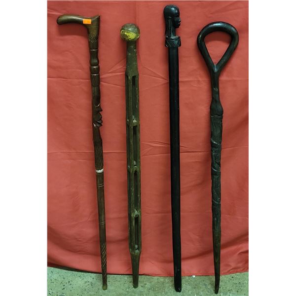 4 Carved Wooden Walking Sticks