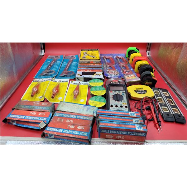 Lot Of Plumb Bobs, Measuring Tapes, Levels, Voltage Tester, Sharpening Stones & Tools