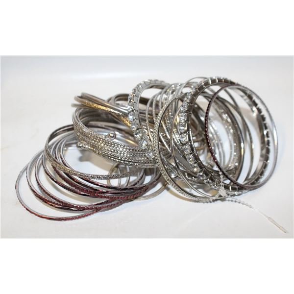 LARGE VOLUME OF SILVER TONE BRACELTS PLUS