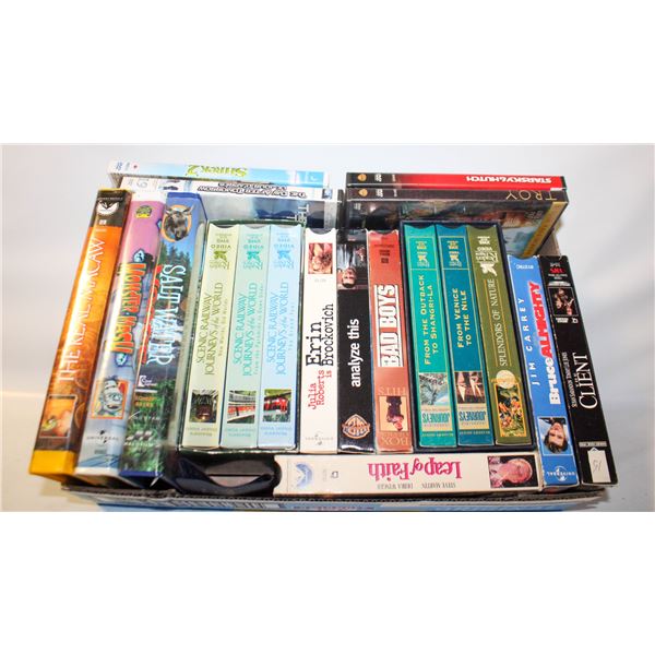 2 FLATS OF DVDS & VHS.  VARIOUS TITLES