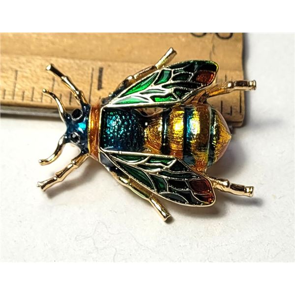 20)  GOLD TONE WITH YELLOW, BLACK, GREEN